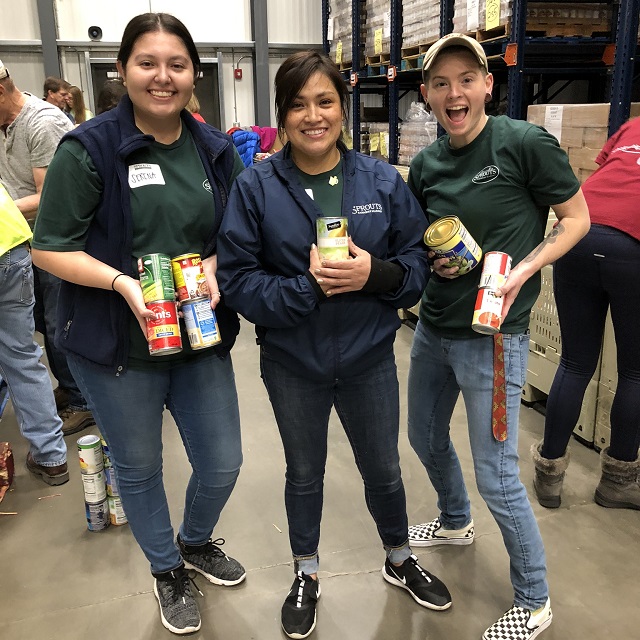 Sprouts team members volunteering at a food bank