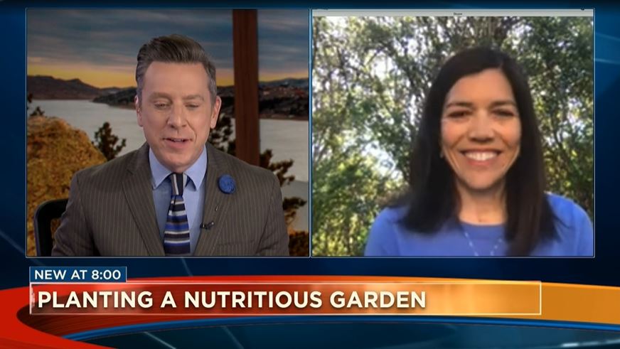 News broadcast of reporter and registered dietitian talking about local gardening program