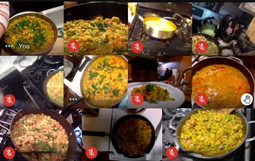 A screenshot of paella dishes, prepared by students in an online cooking class.