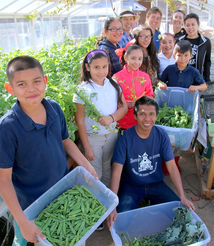 Manzo Elementary students and teachers in the greenhouse